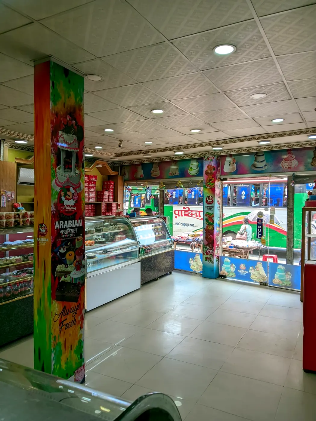 Arabian Cake & Sweets shop interior with cake displays